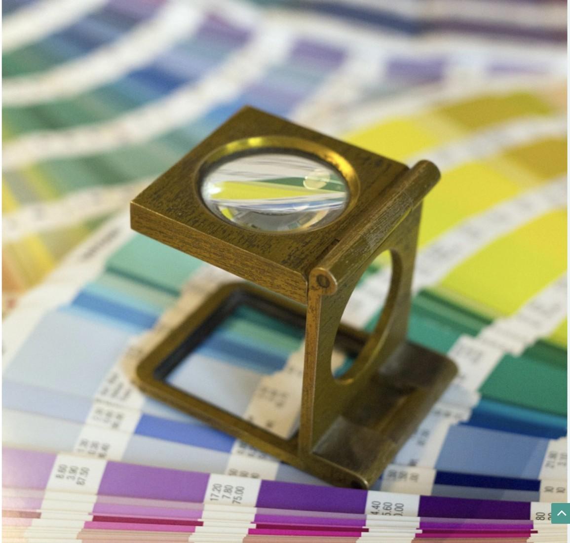 Color swatches and magnifying glass